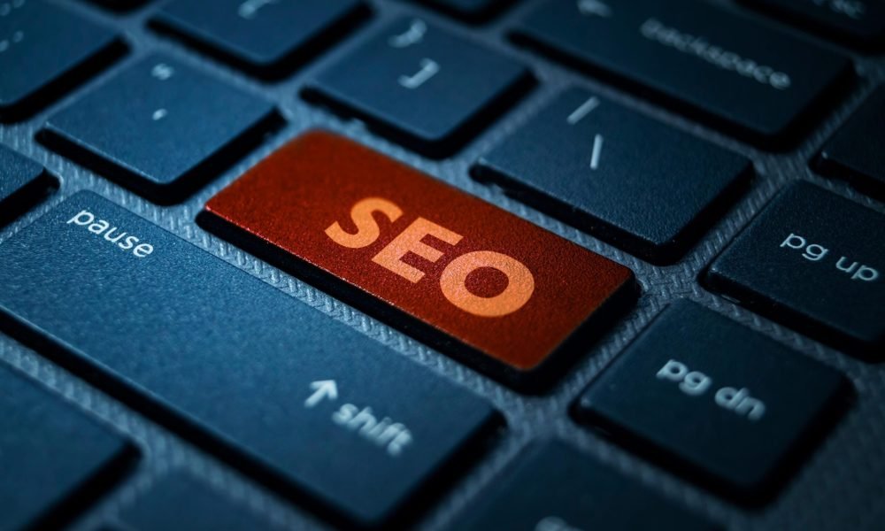 seo-red-button-on-blue-keyboard-close-up-2026-03-25-06-29-14-utc