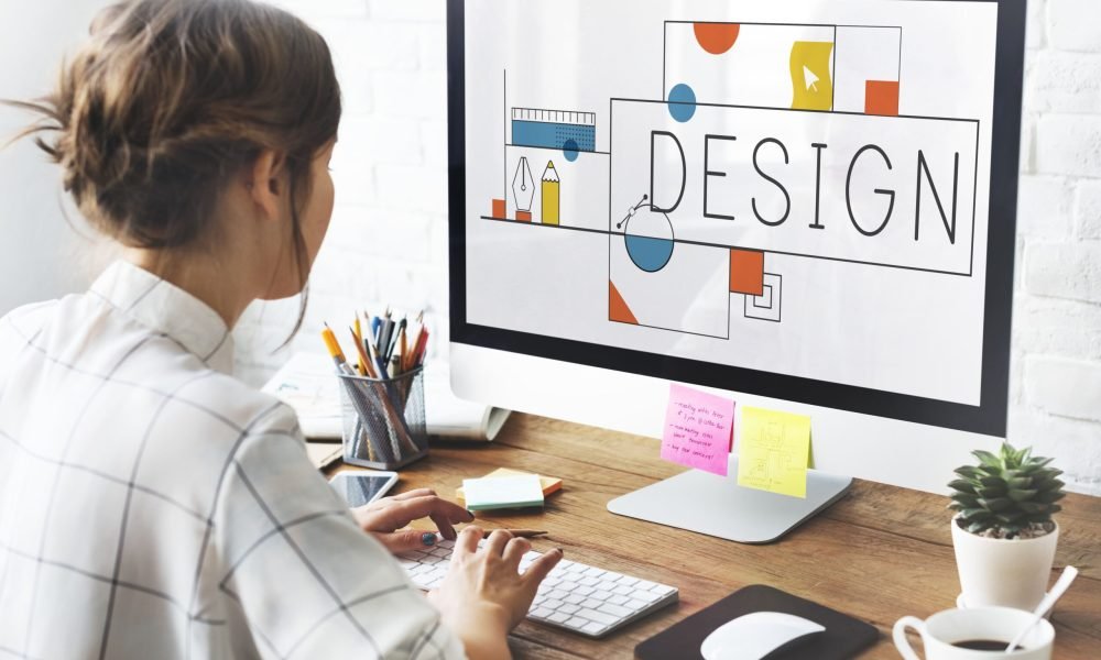 woman-works-on-computer-at-wooden-desk-2026-03-18-11-47-28-utc